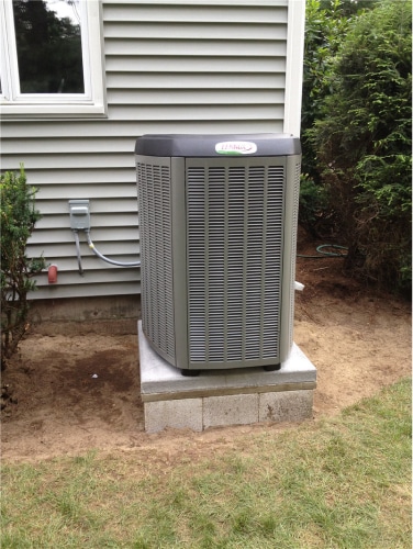 Air conditioning unit outside of a house