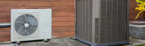 Air conditioner and heat pump outside a Nashua home