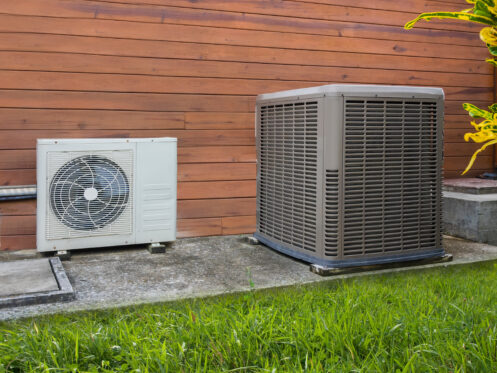 Air conditioner and heat pump outside a Nashua home