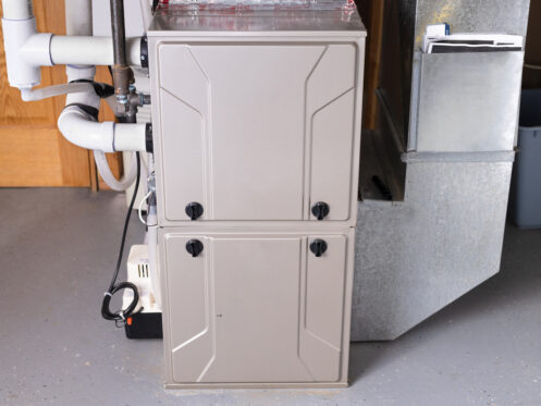 Double stage gas furnace in the basement in a Nashua home