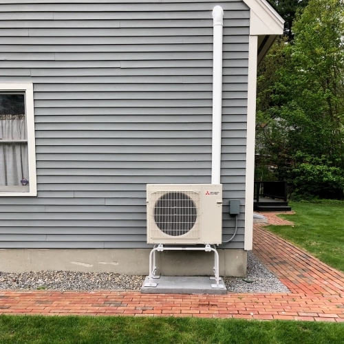 Ductless Unit installed outside of a house