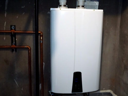 A Tankless water heater in a basement in Nashua